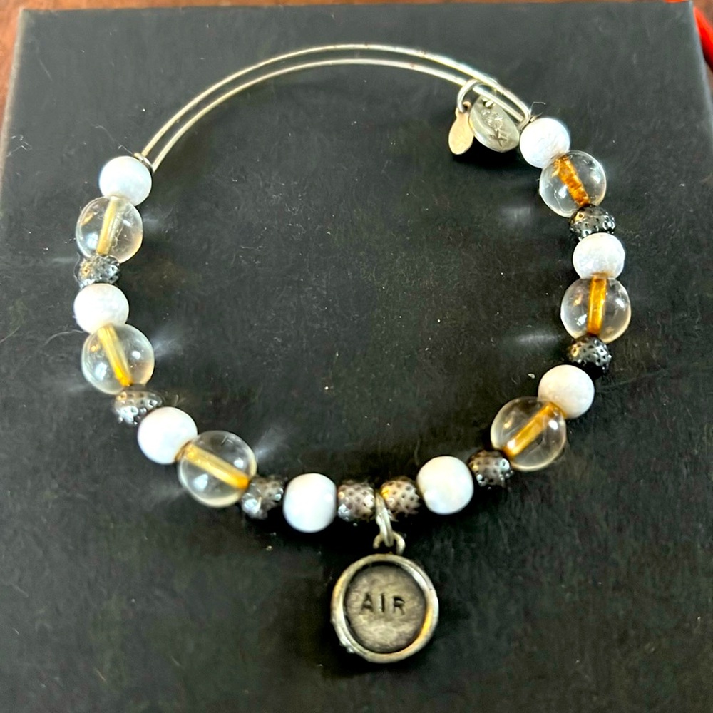 Elegant Beaded Bracelet with Air Charm